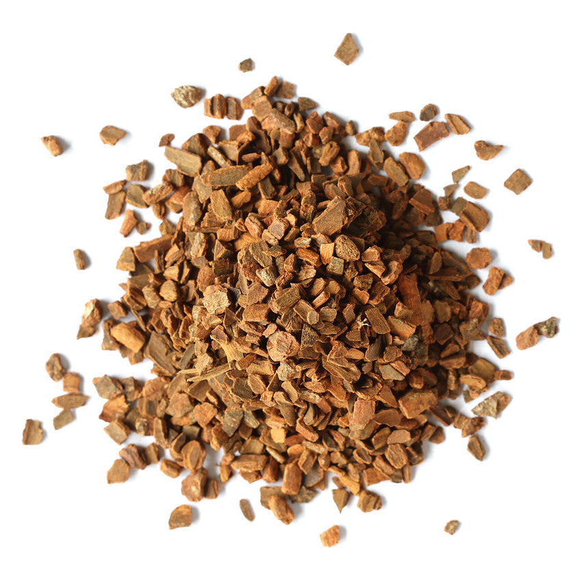 Pile of brown dried cassia cinnamon chips