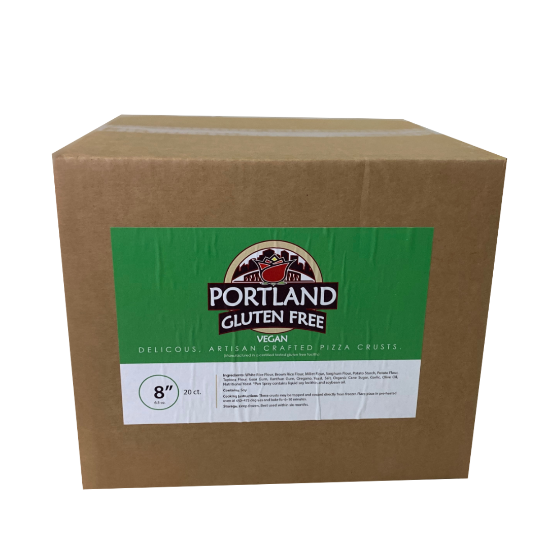 A large brown cardboard box of Portland Gluten Free 8" vegan pizza crusts, featuring a green and white label on the front.