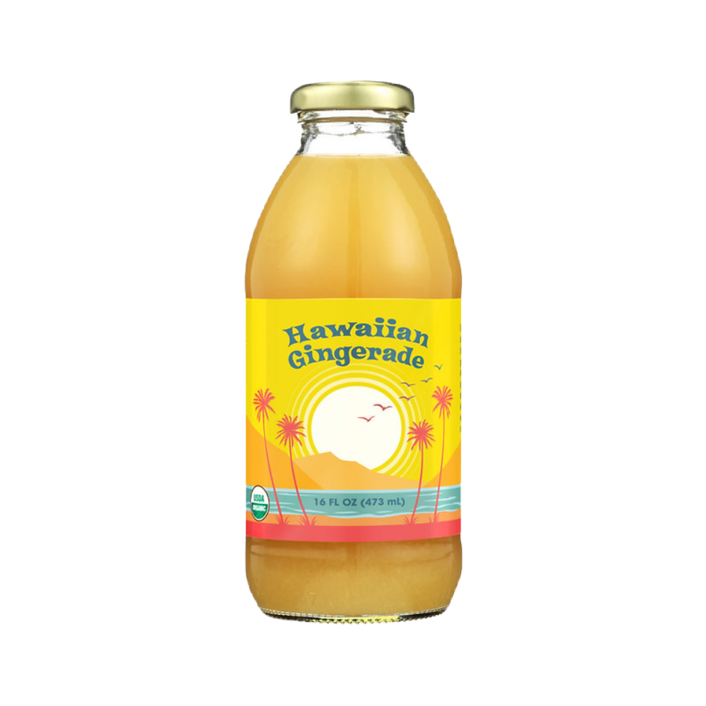A 16 fl oz glass bottle of Big Island Organics Hawaiian Gingerade juice with a yellow label featuring a sunset and palm tree design, topped with a gold cap