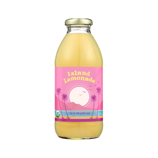 A 16 fl oz glass bottle of Big Island Organics - Island Lemonade with a pink tropical sunset label, filled with yellow lemonade and topped with a gold cap