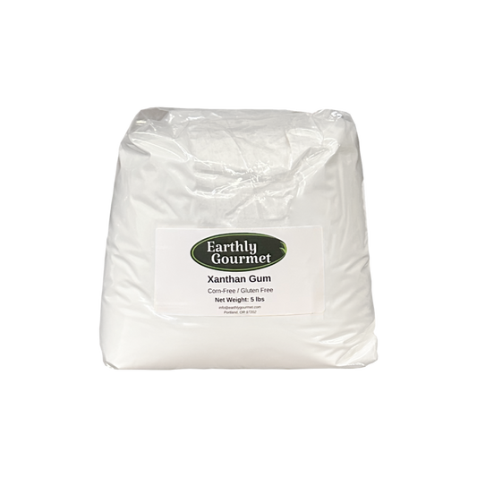 A clear bag of Earthly Gourmet Xanthan Gum, filled with a fine white powder