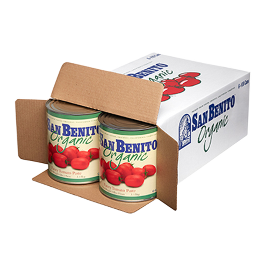 A cardboard box of San Benito Organic tomato paste with two large cans exposed from an open side with the flaps turned out