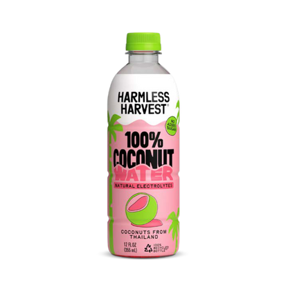A 12 fl oz bottle of Harmless Harvest 100% Coconut Water with natural electrolytes, featuring a pink label with a green cap