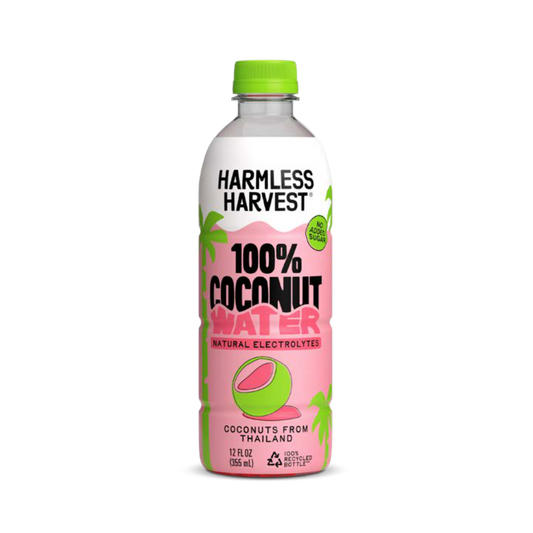 A 12 fl oz bottle of Harmless Harvest 100% Coconut Water with natural electrolytes, featuring a pink label with a green cap